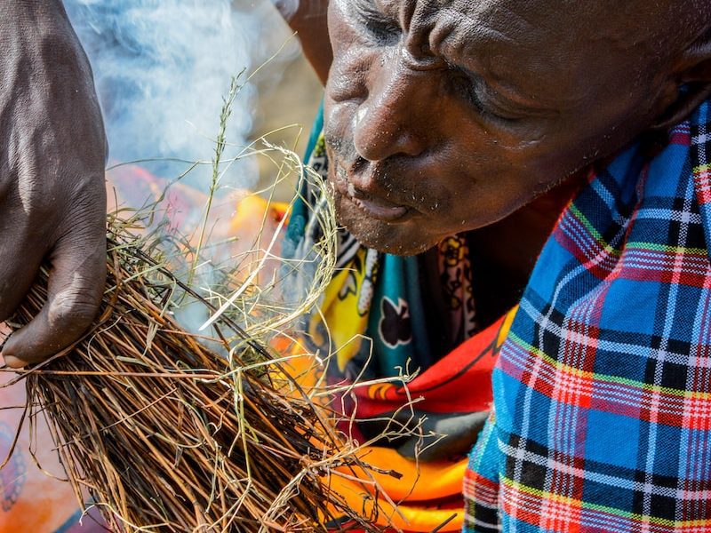 person making fire